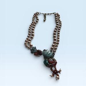 Artistic Seashell and Pearl Necklace